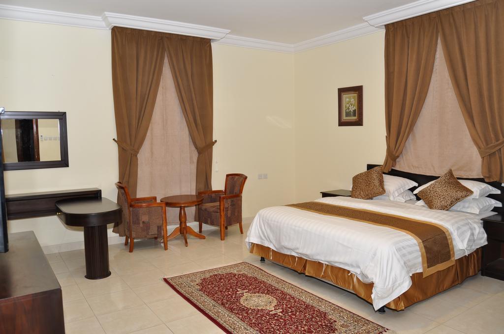 منازل بجيلة للاجنحة الفندقية Manazel Begela Hotel Apartments Ет-Таїф Номер фото
